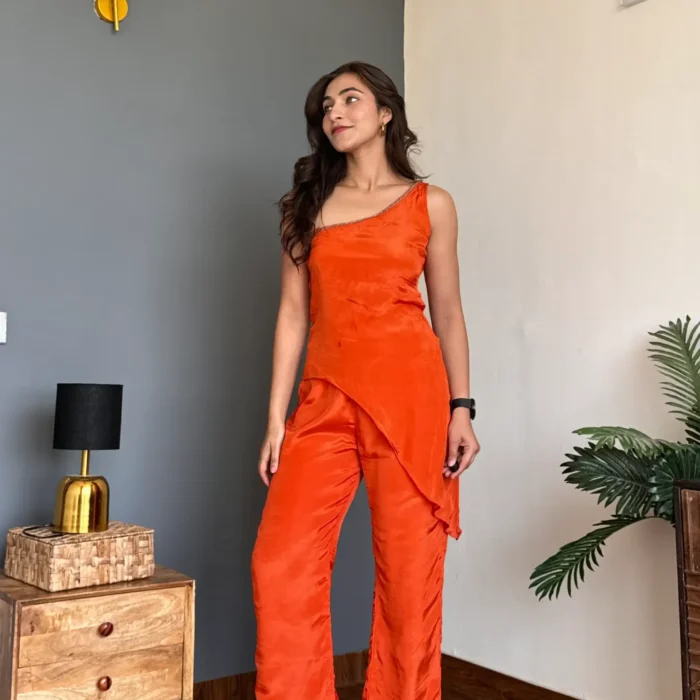 Off shoulder ⁠rust crepe co-ord set with cut dana