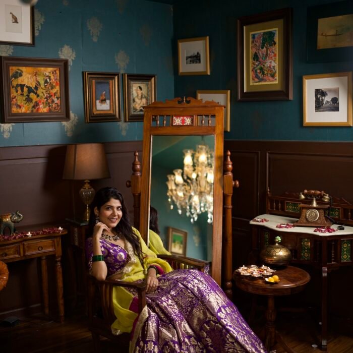 Purple banarasi lehenga paired with plunge neck choli and embroidered dupatta.