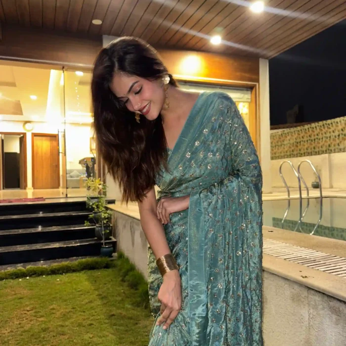 Green tissue silk Cutdana saree